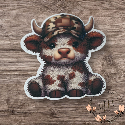Baby cow in hat